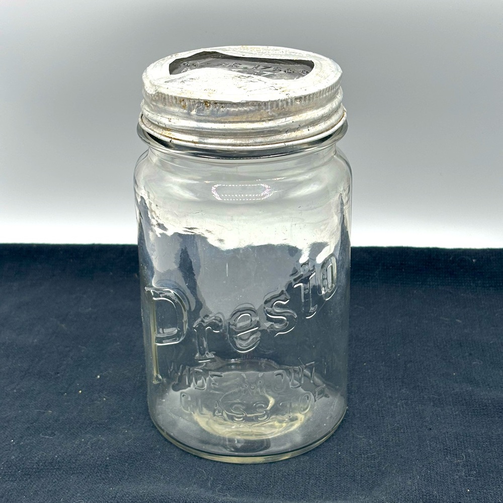 VTG. Rare Presto wide mouth cylindrical shape qt. Jar with glass bow tie lid.